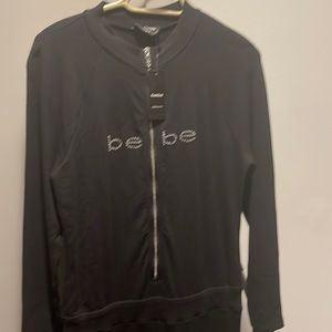 Brand new Bebe jumpsuit, Never worn , with tags !! Must go !! Sz medium